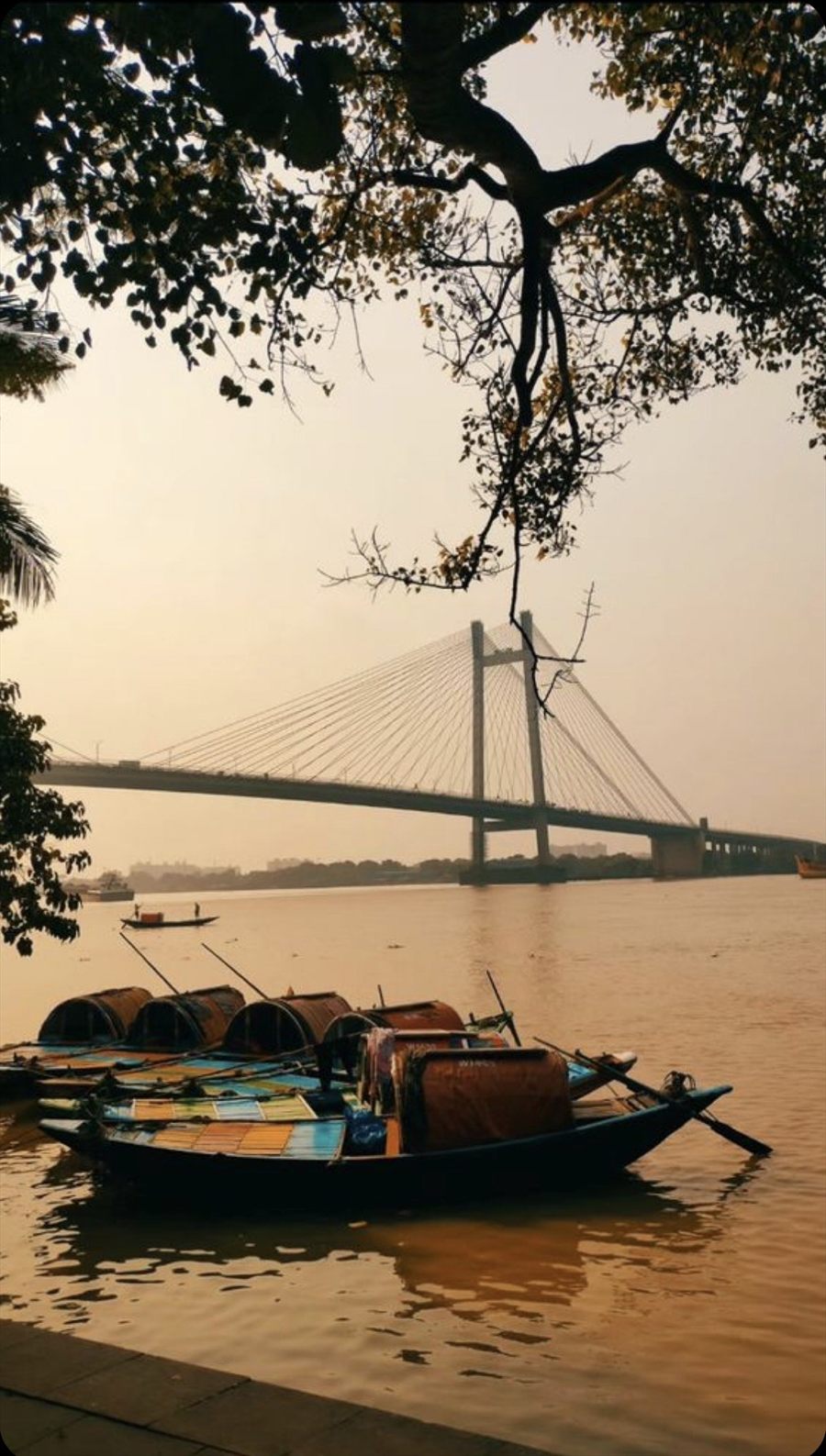 Boats waiting along the Yamuna riverbank